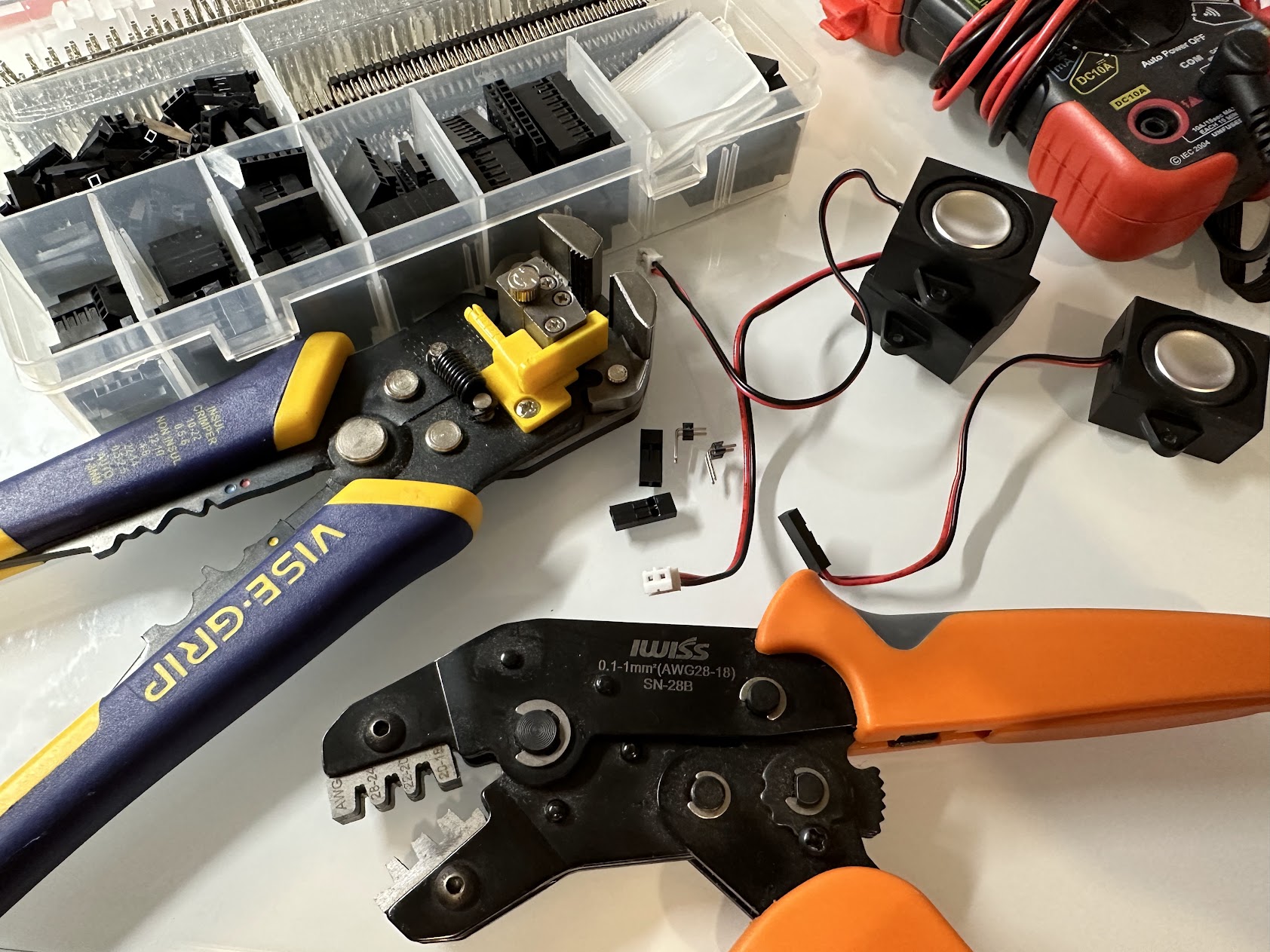Crimping tool, wire stripper, and Dupont connector components